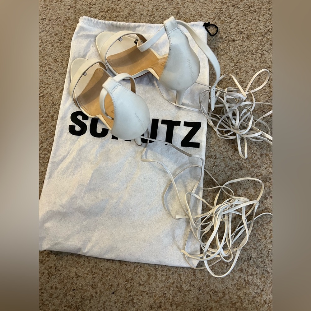 Schutz white leather heeled sandals with lace up straps